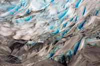 Juneau, Alaska, USA. Reid Glacier - Glacier Bay National Park, Alaska. Patterns of ice and snow on the Reid Glacier in Glacier Bay National Park, Alaska. Reid Glacier is an 11-mile-long (18 km) glacier in the U.S. state of Alaska.