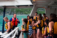 Juneau, Alaska, USA. Passengers of the cruise Safari Endeavour take a polar plunge at Frederick Sound. Stephen's Passage. Petersberg. Alaska. USA. The Polar Plunge was offered here in Gut Bay this morning, at 9:45am and 11:00am.