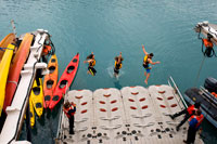 Juneau, Alaska, USA. Passengers of the cruise Safari Endeavour take a polar plunge at Frederick Sound. Stephen's Passage. Petersberg. Alaska. USA. The Polar Plunge was offered here in Gut Bay this morning, at 9:45am and 11:00am. 