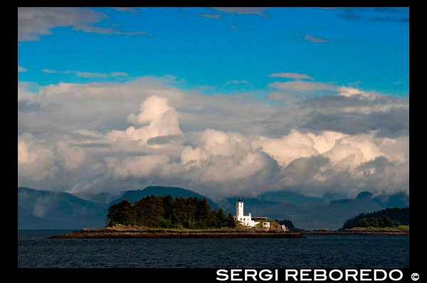 Five Fingers Lighthouse. Frederick Sound. Stephen's Passage.  Petersberg Alaska. Spend the day exploring in Frederick Sound and Stephen's Passage — another excellent chance to view humpback whales and other marine wildlife. Pass by Five Fingers Lighthouse and watch for playful antics at a large sea lion haulout made from dozens of rocky islets. Later, cruise picturesque bays, where evergreen forests crowd the shores. The Five Finger Lighthouse lights the waterways of Frederick Sound and Stephens Passage in Southeast Alaska. It is located on a small island in the midst of other islands known as the Five Finger Islands 65 miles south of Juneau, 40 miles north of Petersburg and about 20 miles from Kake, Alaska. The lighthouse has been an active navigational aid since 1902. The Five Finger Lighthouse is owned and managed by the Juneau Lighthouse Association, a 501 (C) (3) non-profit dedicated to the restoration, preservation and future public accessibility to the lighthouse.