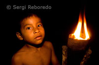 Yagua town. Interior of a cabin to attend a kind of ceremonial dance called bujurqui, where they dance with fire in a circle.