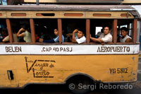 Passenger bus runs between the airport and downtown Iquitos.