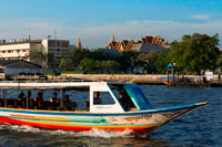 Bangkok. Chao Praya Express Boat Bangkok, Public boat, ferry. Bangkok. Asia.  The Chao Phraya river makes a great way to get around, since many of the major tourist sites are easily accessible from the river. Chao Praya River Express operates a regular boat service up and down the river. Sort of a bus on the water. Fares are extremely cheap - you can get just about anywhere for 11 Baht to 25 Baht (0.34 USD to 0.76 USD) depending on the distance and the type of boat. There are piers next to many of the riverside hotels. Even if you aren't staying on the river, if you are staying close to the elevated train system, you can catch a train to the Taksin Bridge station. A River Express pier is on the river right below the station, and there is generally someone on duty at the pier to sell you a ticket and help plan your trip. The boats can be dangerously crowded during peak traffic times, so avoid rush hours.. Chao Phraya Pier Guide. 