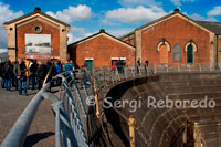 Thompson Graving Dock. Construction of the Thompson Graving Dock began in 1904 beside the pump-house that served the Alexandra Graving Dock. It was completed in time for the dry dock work on the RMS Olympic, which was completed and ready duty on 31st May 1911 – the same day that the hull of the Titanic was launched. The Thompson Graving Dock was, at the time of its construction, the largest dry dock in the world. The dock is 268m in length and 13.4m deep, but despite its scale the imagination still has to employed to envision the massive bulk of the Titanic towering out of it. At the seaward end of the dock is a massive set of gates that were closed behind the ship as it entered, before the water was pumped from the dock. The pumphouse had been upgraded to serve the new dock and was capable of draining the 105 million litres (23 million gallons) of water that it contained in just just 2 hours. The Thompson Graving Dock & Pumphouse are situated within (and owned and operated by) the Northern Ireland Science Park on the Queen’s Road, near the Oddysey. Access to the site seems to be best done by bike, on foot or by bus. Access by car is possible but the parking at the science park does not seem to be open to the public (if you know differently then leave a comment below!). The café and visitor centre in the pumphouse is open from 10am to 4pm daily and there are two tours of the pumphouse each day. More information and contact details for the visitor centre can be found at the Titanic Dock website. 