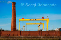 The Samson and Goliath gantry cranes have become city landmarks. Harland & Wolff is now a leading offshore fabrication and ship repair yard like the built of Titanic in 1912. Harland and Wolff Heavy Industries is a Northern Irish heavy industrial company, specialising in shipbuilding and offshore construction, located in Belfast, Northern Ireland. The shipyard has built many ships; among the more famous are the White Star trio Olympic, Titanic and Britannic, the Royal Navy's HMS Belfast, Royal Mail's Andes, Shaw Savill's Southern Cross and P&O's Canberra. The company's official history, "Shipbuilders to the World" was published in 1986. As of 2011, the expanding offshore wind power industry has taken centre stage and 75% of the company's work is based on offshore renewable energy. Faced with competitive pressures (especially as regards shipbuilding), Harland and Wolff sought to shift and broaden their portfolio, focusing less on shipbuilding and more on design and structural engineering, as well as ship repair, offshore construction projects and competing for other projects to do with metal engineering and construction. This led to Harland and Wolff constructing a series of bridges in Britain and also in the Republic of Ireland, such as the James Joyce Bridge and the restoration of Dublin's Ha'penny Bridge, building on the success of its first foray into the civil engineering sector with the construction of the Foyle Bridge in the 1980s. Harland and Wolff's last shipbuilding project (to date) was the MV Anvil Point, one of six near identical Point class sealift ships built for use by the Ministry of Defence. The ship, built under licence from German shipbuilders Flensburger Schiffbau-Gesellschaft, was launched in 2003. 