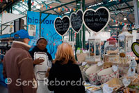 St George’s Market is one of Belfast’s oldest attractions. St George's Market is the last surviving Victorian covered market in Belfast, Northern Ireland. It is located on May Street, close to the River Lagan and the Waterfront Hall. Belfast Corporation (now Belfast City Council) commissioned the building of St George’s Market, which was built in three phases between 1890 and 1896. Before 1890 St George's Market was an open market and most likely contained a slaughterhouse and a meat market. The original (pre 1890) market was smaller than the new structure. The city surveyor (responsible for the new Albert Bridge following its collapse in the 1880s) JC Bretland designed the building. It was built in red brick with sandstone dressing. Externally it features Roman styled arches with Latin and Irish inscriptions - the City’s Latin motto "Pro Tanto Quid Retribuamus", meaning "what shall we give in return for so much?" and the Irish phrase "Lámh Dearg na hÉireann", "Red Hand of Ireland". The main entrance arch displays the Belfast Coat of Arms. This newly covered market opened to the public on 20 June 1890. 