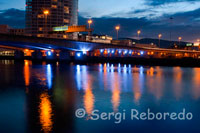 One of the bridges in the center of Belfast over the River Lagan. The River Lagan (from Irish: Abhainn an Lagáin meaning "river of the low-lying district"; Ulster Scots: Lagan Wattèr) is a major river in Northern Ireland which runs 40 miles (60 km) from the Slieve Croob mountain in County Down to Belfast where it enters Belfast Lough, an inlet of the Irish Sea. The River Lagan forms much of the border between County Antrim and County Down. It rises as a tiny fast moving stream off the Transmitter road near to the summit of Slieve Croob. From here it continues on its journey to Belfast through Dromara and Dromore. On the lower slopes of the mountain it is joined by another branch from Legananny (Cratlieve) Mountain, just opposite Slieve Croob. At Dromara, about four miles from its source, its height above the sea is 390 ft (119m). As the river continues on its journey to Belfast it turns east to Magheralin into a broad plain between the Antrim plateau and the plateau of Down. 