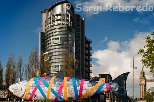 The Big Fish also called the Bigfish is a printed ceramic mosaic sculpture by John Kindness 10 metres long constructed in 1999 in Donegall Quay in Belfast, near the Lagan Lookout and Custom House. The Big Fish's image appears on Belfast and Northern Ireland related tourism material. The outer skin of the fish is a cladding of ceramic tiles decorated with texts and images relating to the history of Belfast. Material from Tudor times to present day newspaper headlines are included along with contributions from Belfast school children (including a soldier and an Ulster Fry). The Ulster Museum provided the primary source of historic images, while local schools/day centres located along the line of the River Farset were approached to provide drawings for the fish. Images were provided by Glenwood Primary School, St Comgalls and Everton Day Centres. The Big Fish also contains a time capsule storing information/images/poetry on the City.