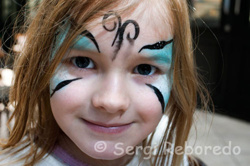 A child with painted face in St George’s Market. In addition to these local delicacies, there is also a fusion of tempting continental and speciality foods from around the world. Included are such delights as wild boar, cured meats, venison, Spanish tapas, Caribbean foods, Mexican and Slavonic foods, continental coffees and teas, Italian olive oils with traditional French Crepes and extraordinary French pastries to mention just a few. Added to this plethora of tempting foods the Saturday market also encompasses flower stalls ensuring this Saturday market is a kaleidoscope of colour.  St. Georges City Food & Garden Market is more than just a shopping experience. Customers can sample the produce, relax with a coffee and a newspaper against a backdrop of live jazz or flamenco music. This market is a real Saturday treat and a great outing for all the family. In a survey published by The Guardian newspaper's travel section in January 2010, St. George's Market came sixth in the UK ‘top ten’.**  Transport A free market bus runs every 20 minutes between the City Centre (outside Boots the Chemist, Donegall Place or HMV, Castle Place) and the market. Bus departs 8.00am on Friday and every 20 minutes thereafter. Bus departs 9.00am on Saturday and every 20 minutes thereafter.  Nearest customer parking at Hilton car park opposite the market. For more information on trading at St Georges market or hiring St Georges Market please visit http://www.belfastcity.gov.uk/stgeorgesmarket/index.asp 