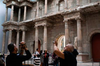 Berlin. Germany. Berlin, Germany. Interior of Pergamon Museum showing Gate of Miletus. Newly restored Market Gate of Miletus at the Pergamon Museum on Museumsinsel in Berlin. The Market Gate of Miletus (German: das Markttor von Milet) is a large marble monument in the Pergamon Museum in Berlin, Germany. It was built in Miletus in the 2nd century AD and destroyed in an earthquake in the 10th or 11th century. In the early 1900s, it was excavated, rebuilt, and placed on display in the museum. Only fragments had survived and reconstruction involved significant new material, a practice which generated criticism of the museum. The gate was damaged in World War II and underwent restoration in the 1950s. Further restoration work took place in the first decade of the 21st century.