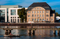 Berlin, Germany, rowboat, canoe and sailing boat on the Spree. Experience Berlin from a kayak. See Tierpark and Zoologischer Garten from the water, and learn about the capital's impressive water lock system. Explore the length of the U1 line, suspended above the canal, then go for a trip on the Spree. Set off on an exciting, unique trip. The tour begins in the Berlin Kreuzberg district at the docks of the van Loom boat restaurant.  For the trip you'll have an expert on hand to greet you before the tour beings. The guide will then help you to deploy. While you warm up for the trip, you will have the opportunity to learn a little about the interesting history of the Landwehr Canal.