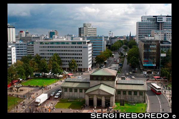 Views of Wittenbergplatz in Kurfürstendamm from KaDeWe, Tauentzienstrasse.  Wittenbergplatz (after the city of the same name) is a square in the western part of Berlin, Germany, within the district of Schöneberg near the border with Charlottenburg. It was laid out between 1889 and 1892 and named after the storming of the town of Wittenberg on 14 February 1814 by Prussian troops under General Bogislav Friedrich Emanuel von Tauentzien in the course of the War of the Sixth Coalition. The square forms the eastern terminus of the Tauentzienstraße, a major shopping street, connecting it with Breitscheidplatz. The Kaufhaus des Westens (KaDeWe), opened in 1907 and today the largest department store in Continental Europe, lies on one corner of Wittenbergplatz and Tauentzienstraße. The northern side of the square is home to street markets four times a week. The centre of the square is occupied by the impressive entrance hall of the Wittenbergplatz U-Bahn station designed by Alfred Grenander in 1912. 