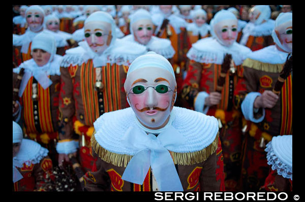 Belgium, carnaval of Binche. UNESCO World Heritage Parade Festival. Belgium, Walloon Municipality, province of Hainaut, village of Binche. The carnival of Binche is an event that takes place each year in the Belgian town of Binche during the Sunday, Monday, and Tuesday preceding Ash Wednesday. The carnival is the best known of several that take place in Belgium at the same time and has been proclaimed as a Masterpiece of the Oral and Intangible Heritage of Humanity listed by UNESCO. Its history dates back to approximately the 14th century. Events related to the carnival begin up to seven weeks prior to the primary celebrations. Street performances and public displays traditionally occur on the Sundays approaching Ash Wednesday, consisting of prescribed musical acts, dancing, and marching. Large numbers of Binche's inhabitants spend the Sunday directly prior to Ash Wednesday in costume. The centrepiece of the carnival's proceedings are clown-like performers known as Gilles. Appearing, for the most part, on Shrove Tuesday, the Gilles are characterised by their vibrant dress, wax masks and wooden footwear. They number up to 1,000 at any given time, range in age from 3 to 60 years old, and are customarily male. The honour of being a Gille at the carnival is something that is aspired to by local men