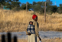 Some local tribes living on the edge of the reserve near Camp Khwai River Lodge by Orient Express in Botswana , within the Moremi Game Reserve Wild . Botswana. The first inhabitants of present Botswana were probably ancestors of the San ( also known as Bushmen ) hunters and gatherers , who now inhabit the arid steppes of south-western Botswana , and the Khoikhoi , from the north. Bantu -speaking tribes arrived in the region in the first century BC The ancestors of the Tswana , (now majority nation ) , were installed between the eleventh and twelfth centuries in the plains of the Vaal River (now the South African province of Transvaal ) . The Tswana were merged into eight powerful clans . The clan rivalries did not allow the Tswana create a kingdom like other nations in southern Africa . The music and dance is one of the strongest and most interesting attractions of Botswana. Both are linked and is characterized by its upbeat rhythms and catchy . In the Cultural Center Maitisong can appreciate music performances of all types as well as traditional dances.