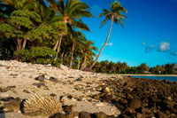 Aitutaki. Cook Island. Polynesia. South Pacific Ocean. Beach at Aitutaki Lagoon Resort & Spa Hotel. Paradise is a much-overused word, but perhaps nowhere is it more apt than here. You will find there are many diversions to dip into, but so often, the simple pleasures will seem more than sufficient. Loll on the beach, laze in a hammock, take a languid dip in the luminous lagoon, relax deeply into one another's company, re-discover the best in yourself and each other. In this place, this paradise, you have the time and the space to rekindle your own good humour, to relight the fire and passion in your embrace, and to truly live in the moment. From the safe sanctuary and separation afforded by your own island hideaway, your mind, body and soul have the opportunity to be healed of life's workaday stresses. Your spirit has a chance to renew itself as you gain a fresh, more balanced perspective on what's truly important in your life. This is the luxury of distance, the ultimate luxury of your own private island sanctuary. Nothing quite prepares you for the deep peace and tranquillity of being on your own private island resort. But once you've experienced the uniqueness, the specialness, of it, nothing else ever quite measures up. This is alluring Aitutaki. When you leave, a piece of it will stay in your heart for always, yearning to return to the place on Earth closest to Heaven. Facilities, Features & Services at The Aitutaki Lagoon Resort & Spa include: Best location in the Cook Islands – nothing can beat being directly on the world’s most beautiful lagoon … the only resort located right on Aitutaki Lagoon (check out the map). WOW!  