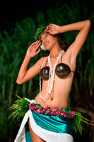 Aitutaki. Cook Island. Polynesia. South Pacific Ocean. A beautiful woman interprets dances of Polynesia at the Aitutaki Lagoon Resort & Spa Hotel. Everyone at The Rarotongan Beach Resort & Spa is very proud of our Cook Islands history, our culture, our music, our dance and our people, and we’re excited to be able to share it with you as part of our Complimentary Daily Activities Programme.  Often the word ‘culture’ conjures up something heavy, worthy, and not very interesting. Not so in Rarotonga. Here ‘culture’ is another word for fun, laughter and high spirits. Nowhere on Earth will you find a people more genuinely willing to share their culture with you - in a natural, unaffected way, peppered with a lot of good humour.  Some of the highlights of our range of cultural activities include: Coconut Show – see how the masters climb tall coconut palms (technically speaking, not ‘trees’), pluck a nut and show you how to husk and open it Ei (lei) making – In Hawaiian, a lei. In Rarotongan, an ei. Learn to make your own from fresh tropical blooms – one of our most popular activities, and you can wear it to our riveting ‘Legends of Polynesia’ Island Night Dinner / Show that evening. Hura (hula) dancing – once you’ve seen genuine Cook Islands dancing, you’ll realize why these are the best dancers in all of Polynesia, sought after around the world for ‘Polynesian Shows’. You’ll feel good shakin’ your booty – plus you’ll gain a new appreciation for just how skilled they really are.  Then again, they’ve been doing this since before they could walk. Log drum playing – when Cook Islanders play their drums, you can hear the heartbeat of Mother Earth. The instinctual sense of rhythm, the super-human speed of the beat – it’s a sound which drives straight to your soul. They make it look natural and almost effortless. Just try it and see. Ukelele playing – for many, the lilting island strings is like the signature sound of the South Pacific. 