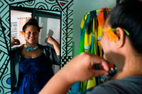 Atiu Island. Cook Island. Polynesia. South Pacific Ocean. A client is tested a necklace on Andrea's Fibre Art Studio in Atiu Island.  The Studio is also well known for its tivaivai, the Cook Islands' traditional ceremonial cloths. "Tivaivai" means patchwork and is the general term for unpadded, unquilted, mostly appliquéd coverlets of about 2.50 m X 3.00 m, sometimes heavily embellished with intricate embroidery. The Studio's works can be found in public and private collections in the Cook Islands and abroad. The National Culture Centre, banks and hotels on Rarotonga, and the Intercontinental Hotel on Maui (Hawaii) commissioned us to create artwork for them. The National Gallery of Victoria in Melbourne (Australia) acquired one of our tivaivai for their permanent collection. Recently, New Zealand's National Museum Te Papa added four of our works to their permanent collection (above). The Atiu Fibre Arts Studio participated in a number of national and international textile exhibitions in the USA, Europe, Australia and Oceania, many of which Andrea curated. She has also lectured about the Cook Islands’ traditional ceremonial cloths and conducted workshops internationally. At the Fibre Arts Studio, we use a wide variety of materials and natural fibres: cotton, silk, linen, tapa (bark cloth). Many of the fabrics are hand-dyed to achieve a perfect colour match with the natural materials. On request, Andrea conducts private workshops at the Studio for textile enthusiasts, who are interested in learning new textile techniques and enjoy working in a tranquil island environment. 