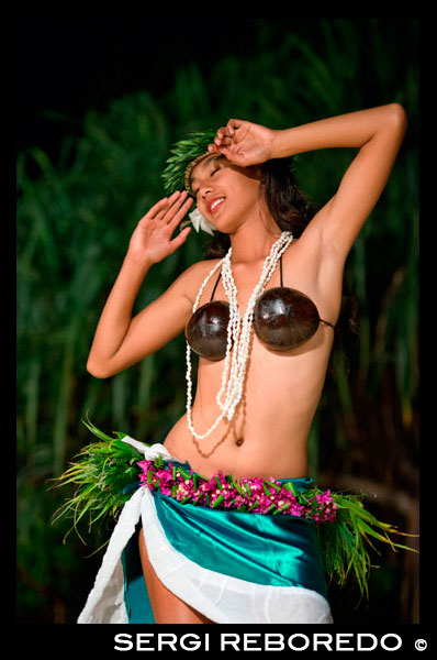 Aitutaki. Cook Island. Polynesia. South Pacific Ocean. A beautiful woman interprets dances of Polynesia at the Aitutaki Lagoon Resort & Spa Hotel. Everyone at The Rarotongan Beach Resort & Spa is very proud of our Cook Islands history, our culture, our music, our dance and our people, and we’re excited to be able to share it with you as part of our Complimentary Daily Activities Programme.  Often the word ‘culture’ conjures up something heavy, worthy, and not very interesting. Not so in Rarotonga. Here ‘culture’ is another word for fun, laughter and high spirits. Nowhere on Earth will you find a people more genuinely willing to share their culture with you - in a natural, unaffected way, peppered with a lot of good humour.  Some of the highlights of our range of cultural activities include: Coconut Show – see how the masters climb tall coconut palms (technically speaking, not ‘trees’), pluck a nut and show you how to husk and open it Ei (lei) making – In Hawaiian, a lei. In Rarotongan, an ei. Learn to make your own from fresh tropical blooms – one of our most popular activities, and you can wear it to our riveting ‘Legends of Polynesia’ Island Night Dinner / Show that evening. Hura (hula) dancing – once you’ve seen genuine Cook Islands dancing, you’ll realize why these are the best dancers in all of Polynesia, sought after around the world for ‘Polynesian Shows’. You’ll feel good shakin’ your booty – plus you’ll gain a new appreciation for just how skilled they really are.  Then again, they’ve been doing this since before they could walk. Log drum playing – when Cook Islanders play their drums, you can hear the heartbeat of Mother Earth. The instinctual sense of rhythm, the super-human speed of the beat – it’s a sound which drives straight to your soul. They make it look natural and almost effortless. Just try it and see. Ukelele playing – for many, the lilting island strings is like the signature sound of the South Pacific. Enjoy strumming your own island tune, your way. Pareu tying – there’s so many looks you can get from one length of fabric, why doesn’t the whole world live this way? So easy, breezy and … inexpensive! Palm frond weaving – learn how to make your own sun hat from coconut fronds Ika Mata – learn to make the Cook Islands national dish, yum (make from the freshest tuna steeped in fresh coconut milk, onion, tomato, and a little chilli). Cook Islands culture continues to be something lived and breathed by the people in their every day lives. Because most Cook Islanders speak English, it is relatively easy to gain a little insight into the richness of the culture – unlike places where there is a language barrier, or where tourists are not genuinely welcomed. Our Activities Team is always willing to share their deep love and knowledge of their culture with you as our valued guest.  Immerse yourself in some wonderful aspects of exotic Cook Islands culture, and by doing so, deeply enrich your vacation experience – and have a whole heap of fun doing it!