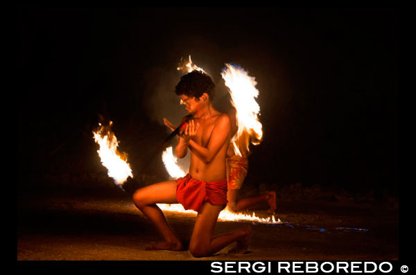 Aitutaki. Cook Island. Polynesia. South Pacific Ocean. A child plays typical fire dances of the Polynesian in the Aitutaki Lagoon Resort & Spa Hotel. Daily Activities Programme. Time and time again our guests remark on how much their holiday has been enriched by the warmth, friendliness, sense of fun and depth of local knowledge shared freely with them by our Activities Team members. And this too is often why they return, time and again, to The Rarotongan rather than stay at an isolated bach. Because here at The Rarotongan, you can enjoy one of the most extensive free activities programmes you are likely to find anywhere on Earth.  It’s all laid on, right here at The Rarotongan. Resort Orientation – others include this as a bonus offer (!!), here at The Rarotongan, it’s a given … Snorkelling Lessons in the Pool or Lagoon – great for when you’re a bit rusty, or haven’t had a go before. Very patient, sympathetic instructors.  	 Snorkelling Safaris in pristine Aroa Lagoon Marine Reserve – it’s good to go with a knowledgeable guide, then use our Snorkelling Map another time and do it your way (yip, we even publish an Aroa Lagoon Snorkelling Map – only at The Rarotongan!) Night Snorkelling – unique to The Rarotongan, and one of our most popular and fascinating excursions Fish Feeding – this is one of the absolute highlights for so many guests, young and young at heart! The fish are the friendliest you’ll fine anywhere Guided Kayaking Safaris – drink in some great views of the majestic mountains from Aroa Lagoon Guided Nature & Village Walks – The Rarotongan is located in beautiful Aroa, between Rutaki and Kavera villages, well away from any other resorts or hotels.  It’s a picturesque little area to explore, especially when you go with someone who knows the locals and the lay of the land. Beach Volleyball on prime Aroa Beach Water Polo in the Waterfalls Pool Tennis Coaching Crab Hunting – of course we employ a catch and release system.	 Crab Racing – people, they’ll bet on anything! Culture – no, this is not a code-word for boring (see below). Check out the Activities Blackboard (located beside the Activities Hut) or your nightly Guest Newsletter for the day’s schedule of activities, and enjoy! Open every day, from 8am to 6pm.