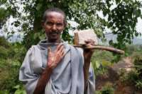 Portrait of an Ethiopian in the area at the foot of the Blue Nile Falls (Abay River). A few years ago, the Ethiopian government inaugurated a hydroelectric plant that uses the gradient of the cataracts of the Nile water is diverted just before jumping into a turbine and produces 750 megawatts of electricity, not much, but enough to bring light and energy lead north of the country. Even left over for export.