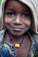 Portrait of a young woman selling souvenirs near the debram Maryam monastery on Lake Tana. This lake is the largest Ethiopian lakes with 85 km long, 65 wide and a depth of approximately 14 meters. Dot the lake over 37 islands and its shores are Gorgora peninsulas, and Zeghe Mendabba (the closest and most visited for its proximity to the city). Obviously, visiting monasteries that are located within the lake, is the most important reason, but also for nature lovers and especially for ornithologists as they will have the opportunity to see storks, herons, eagles, parrots and so to 823 of which 16 species are endemic to Ethiopia, also sometimes can see crocodiles and hippos but I will say that I have not noticed anything.