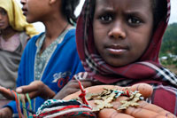 Some children sell souvenirs on the doors of the church of St Mary of Zion in Axum. The holiest shrine in Ethiopia is the Church of St. Mary of Zion in Axum town, there Ethiopians say that is the true Ark of the Covenant of the people of Israel, and is mentioned in the Old Testament ...