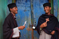 Two clerics at the gates of the monastery of Abba Garima. The Ethiopian Garima Gospels are the earliest illustrated manuscripts of Christianity. Experts placed the work in 1100 AD, but radiocarbon dating indicated that the documents were created on a date between 330 and 650 AD. The monastic tradition says that the monk Abba Garima Gospels copied in a day, after founding the Garima monastery in northern Eiopía, near Adwa. The two manuscripts are composed of 670 pages in total, 28 of which are illustrated, these include four portraits of evangelists and a drawing of the Temple of Solomon.