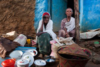 An elderly couple are dedicated to having it all gleaming in the celebration of a birth in the village of Hausein, lack of Gheralta mountains.