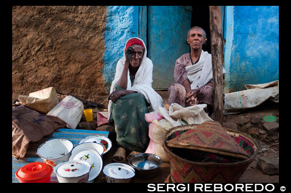 An elderly couple are dedicated to having it all gleaming in the celebration of a birth in the village of Hausein, lack of Gheralta mountains.