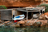 Formentera. Vaixell de pesca tradicional al dia d'estiu. Vaixells Llaüt. Cala Sahona, Formentera, Balears Illes, Espanya. Barbaria Cap.