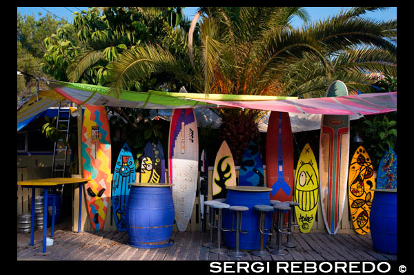 Surf tables in Acapulco Surf Bar, Es Calo, Formentera, Balearic Islands, Spain. Spain; Formentera; island; surf; bar; acapulco; disco; balearic; Baleares; atrraction; destination; Europe; European; art; balearic; bar; board; calo; drink; eat; es; food; formentera; islands; pub; restaurant; spain; surf; holiday; travel; islands; mediterranean; photos; place; spanish; sun; tourism; touristic; vacation; view; Balearics; beautiful; beauty; paradise; fun; happy; coastal; paradisiac; popular