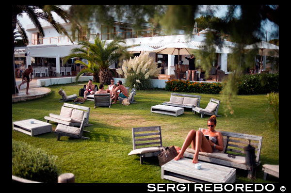 Gecko luxury boutique Hotel, Migjorn beach, Formentera Island, Balearic Islands, Spain, Europe. People reading and relaxing in the garden Spain; Formentera; island; Gecko; Hotel; boutique; luxury; five; stars; four; balearic; Baleares; garden; relax; relaxing; read; reading; book; nice; girl; people; pretty; beauty; atrraction; destination; Europe; European; beach; ca mari; mari; club; holiday; travel; islands; balearic islands; beach; formentera; horizontal; hotel gecko; mediterranean; migjorn; migjorn beach; people; playa de migjorn; sea; seaside; spain; water; mediterranean; photos; place; spanish; sun; tourism; touristic; vacation; view; Balearics; beautiful; beauty; paradise; fun; happy; coastal; paradisiac; popular; destination; eivissa; european; geographie; geography; germany; holiday; hotel gecko; beach club; ibiza; insel; island; islands; islas; mediterenean; mediterranean; migjom; migjorn; photography; photos; platja; playa; playa migjom; sea; south; southern; spain; spanien; spanish; tourism; tourismus; tourist; travel