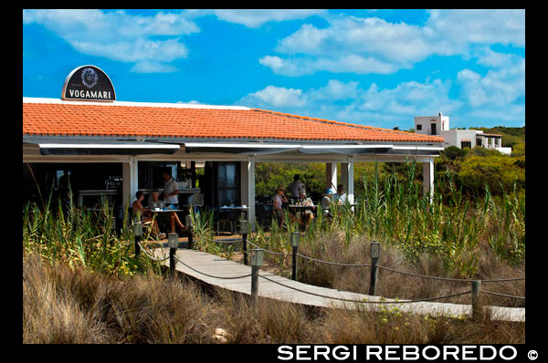 Vogamari Restaurant, Migjorn beach, Formentera island, Balears Islands, Spain. Mediterranean food.  Spain; Formentera; Vogamari; restaurant; traditional; food; bar; gourmet; island; balearic; Baleares; atrraction; background; balearic; beach; beautiful; blue; coast; dinner; eat; escalo; europe; eat; rices; holiday; ibiza; idyllic; island; landmark; landscape; lemon; mediterranean; nature; ocean; outdoor; paella; paradise; places; pot; rice; rock; scenic; sea; seascape; shallow; shore; sky; spain; stones; summer; sun; sunny; table; touristic; traditional; transparent; travel; turquoise; vacation; water; waves; whitedestination; Europe; European; holiday; travel; islands; mediterranean; photos; place; spanish; sun; tourism; touristic; vacation; view; Balearics; beautiful; beauty; paradise; fun; happy; coastal; paradisiac; popular