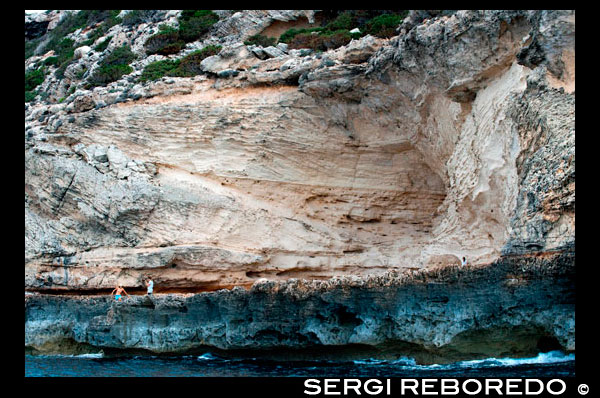 Traditional rocks and stones called Mares in Cala Sahona, Formentera, Balearics Islands, Spain. Barbaria Cape. Spain; Formentera; couple; tradictional; beach; sea; es mares; mares; rock; Cala Sahona; Sahona; inlet; beautiful; take; taken; pictures; nude; blue; clear; coast; coastline; crystalline; active; tourism; funny; happy; els; fishing; formentera; holiday; ibiza; idyllic; island; islands; landmark; landscape; mediterranean; nature; ocean; outdoor; paradise; pier; places; port; pujols; rail; railway; rock; scenic; sea; seascape; spain; stranded; summer; sunny; touristic; traditional; transparent; travel; turquoise; typical; vacation; water; white; wooden; island; balearic; Baleares; atrraction; destination; Europe; European; holiday; travel; islands; mediterranean; photos; place; spanish; sun; tourism; touristic; vacation; view; Balearics; beautiful; beauty; paradise; fun; happy; coastal; paradisiac; popular