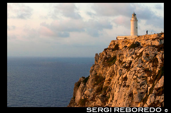 Sunrise. Faro, Faro de la Mola, Formentera, Pitiusas, Islas Baleares, España, Europa España; Formentera; isla; faro; La Mola; Mola; balear; la salida del sol; aérea; vista; puntos de vista; área; baleares; balear; europa; formentera; horizontal; horizontales; horizontales; islas; islas; la; faro; mediterráneo; mediterraneo; mola; mar; Baleares; atrraction; destino; Europa; Europea; vacaciones; viajar; islas; mediterráneo; fotos; colocar; Español; sol; turismo; turístico; vacaciones; vista; fondo; baleares; balear; playa; hermosa; azul; costa; costa; destino; europa; formentera; faros; vacaciones; ibiza; isla; isla; islas; islas; la; hito; paisaje; la luz; faro; ubicaciones; mediterráneo; mola; la naturaleza; océano; al aire libre; el paraíso; perspectiva; pitiusas; lugares; carretera; roca; mar; paisaje marino; cielo; España; Español; verano; turismo; turístico; viajar; vacaciones; agua; camino; blanco; worldBalearics; hermosa; belleza; el paraíso; divertido; feliz; costera; paradisíaca; popular