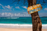 A sign advertises a local beachfront where barbecues are held in the evening on the beach in the west of the island, the most uninhabited touristically speaking. Gili Meno.