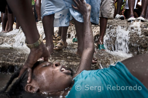 This girl takes several minutes into a trance and a friend or relative helps return to normal status with the thumb pressing the front of his head. Followers of voodoo (vodouisants) believe in one God called Gran Met (Great Teacher) to which all show you devotion. The girl is full trance in one of the pools of Saut d'eau. Voodoo in Haiti arrived with African slaves in fifteenth and sixteenth century, and the reason of their origin is multiple and complex, because all the people who lived there contributing socio-cultural elements in their training. Sin. But before I start a religion. Usually seen as a response of the black African slave operation of the system of his time. Brutally torn from Africa, slaves experienced all kinds of moral and physical punishment. The black code that governs the colony makes the slave is reduced to a mere body, is one thing anyone who takes over Mr. colonizer. And with them, the owners often used abusive and dehumanizing methods including: forced labor, Gigot, imagination, humiliation, death penalty, interdiction of learning to read and write. So, A record of everything, voodoo is not going to be more than a cluster of defense mechanism, disclosed the slaves.