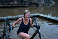 A woman bathes outside the private Sauna Pikkukoski north of the city of Helsinki, Vanhankaupunginselkä lakeside, near the town of Oulunkylä Aggelby. Members pay a fee of EUR 75.60 to join and then another 30 euros per season, ademñas of 10 euros for the key deposit. This open both summer and winter.