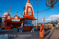 One of the most famous and most visited sites of Haridwar; Har ki Pauri is considered as one of its five main holy sites. Har ki pauri is always crowded with devotees and priests; offering prayers to the Sun God and the holy Ganges. This place is the perfect destination for people deeply in love with religion; philosophy and spiritualism. The auspicious fair of Hindus; the Kumbh mela; is held at Har ki Pauri; after every 3 years. This sacred ghat was built on the bank of Ganges; by King Vikramaditya; in the memory of his brother Bhartrihari. Har ki pauri is famous for Ganga Aarti; a holy ritual of offering prayers to the Ganges. Ganga Aarti takes place on the ghat in the evening; after sunset. A group of Brahmans hold huge fire bowls in their hands and offer their holy mantras to river Ganges; Shiva - the Hindu God of destruction; Surya - the Sun God and the entire Universe. The devotees then offer flowers and earthen lamps - diyas - to river Ganges; in order to pay due regards to their ancestors in heaven. The scenario at Har ki pauri at the time of Ganga-Aarti is mesmerizing. 