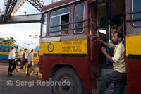 Kolkata bus. Buses are chaotic and can get terribly crowded. A better choice is the slow; trundling trams which circle the city and include stops at Park Circus; Sealdah Railway Station and Howrah. The Metro underground system has thankfully taken something of the congestion from the streets. The one track runs the length of the city; from Dum Dum train station (north) to Tollygunge (south) with stops including Kalighat; Park Street; Esplanade and Maidan. It is well run although often crowded (mainly during morning and evening rush hours); with segregated seats for men and women. There are still some hand-pulled rickshaws mainly in market areas and some around Sudder Street; although there is talk of eventually banning them altogether. Cycle-rickshaws operate in a few areas outside the city centre. Auto-rickshaws (motorised three-wheelers) operate short (often fixed) journeys in city areas (not in the centre) and are cheaper than taxis; agree the fare before you zoom away and seek advice from locals as to what you should be paying before you get in.