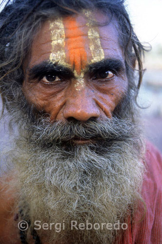 INDIA CROSSING THE RIVER GANGES Vanarasi pilgrim. "Benaras is older than history; older than tradition; older even than legend and looks twice as old as all of them put together"- this is how Mark Twain has described Varanasi; which is one of the ancient cities in the country and has had been the holiest spot for the Hindus for hundreds of years. The epitome of Hindu renaissance; the city has been the abode of knowledge; wisdom; culture; philosophy and worship since ages. People go the city to attain salvation by serving the mythological Gods. The pilgrims take bath in the water of the River Ganga flowing through the city believing that it will wash off their sins.The city is believed to have been the adode of the Hindu mythological gods Lord Shiva and Parvati. The civilization of the city dates back to thousands of years and is even believed to have been the dwelling place of Buddha for quite sometime. Being the birthplace of Parsvanath; the city has also been one of the major spots of attraction for the Jains. Precisely Varanasi is a land of spiritualism; language; literature; medical science; mysticism and Yoga. It has never failed to provide solace to the minds of the believers.