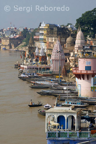 INDIA CROSSING THE RIVER GANGES Varanasi Ghats are perhaps the most holiest place in the world; where one is relieved from all the worldly responsibilities and one enters into a domain that is dominated by the other worldly pleasures. Varanasi is often referred to as the "City of Ghats". The city can boast of more than 100 ghats; out of which some are known all over the world. As Varanasi is situated on the banks of the Ganges; so most of the mundane day to day activities take place on the ghats.; Some of the important Ghats of Varanasi are: Assi Ghat is situated in the south of Varanasi; which symbolizes the convergence of Ganga and Assi river. Dasaswamedh Ghat is one of the most important and lively ghats of Varanasi where one can see the Sadhus offering prayers to the holy Ganga. Harish Chandra Ghat is one of the oldest ghats; which serves as one of the cremation grounds of Varanasi. Manikarnika Ghat is another cremation ground of Varanasi. It is believed that one who is cremated here is released from the cycle of birth and rebirth. Tulsi Ghat is dedicated to poet Tulsi Das. All the cultural activities takes place in this ghat. The Ghats of Varanasi serve multiple purpose. While on one hand; pilgrims and tourists can offer prayers; on the other hand they serve as important commercial centers.; Many people go to the ghats to relieve themselves of the strains and tensions of daily life. The Ghats are an indispensable part of Varanasi that adds to the grandeur and grace of the city.