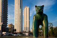 Sculpture of a panther at Green area in Cinta Costera Pacific Ocean Coastal Beltway Bahia de Panama linear park seawall skyline skyscraper modern. Coastal Beltway (Cinta Costera), Panama City, Panama. Panama City is one city in Central America where congestion has reached crisis point. The city is going through an unprecedented period of stability and investment and there are ample public funds for infrastructure improvement projects. One of the newest road improvement projects is the Coastal Beltway or Cinta Costera (translation means literally 'coastal tape') project. This project intends to decongest the road 