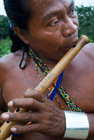 Music and dancing in the village of the Native Indian Embera Tribe, Embera Village, Panama. Panama Embera people Indian Village Indigenous Indio indios natives Native americans locals local Parque National Chagres. Embera Drua. Embera Drua is located on the Upper Chagres River. A dam built on the river in 1924 produced Lake Alajuela, the main water supply to the Panama Canal. The village is four miles upriver from the lake, and encircled by a 129.000 hectare National Park of primary tropical rainforest. Lake Alajuela can be accessed by bus and mini-van from the city of Panama. It lies an hour from the city, close to the town of Las Cumbres. From a spot called Puerto El Corotu (less a port than a muddy bank with a little store that serves as a dock to embark and disembark from canoes) on the shore of the lake, it takes 45 minutes to an hour to climb up the Rio Chagres to Embera Drua