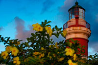 Faro de Sainte Suzanne. SSAUPASS (Association for the Safeguarding of Sainte-Suzanne) Notes: This lighthouse was restored in 1996. A local heritage group, Association for the Safeguarding of Sainte-Suzanne (ASSAUPASS) organizes tours that include the lighthouse. The lighthouse also serves as a venue for art exhibitions organized by ASSAUPASS. Tower Height: 82 Height of Focal Plane: 157 Characteristic and Range: Three white flashes every 15 seconds, visible for 23 nautical miles. Torre description: white cylindrical tower with a red band and a green dome, living nearby. This light is operational Date Established: 1846 Current Date Tower Built: 1846 Date Automated: 1989 Current Use: Active aid to navigation. Open to the public? Yes.