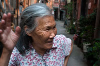 China Old People Shanghai Shops Stall Street Town. The Old City of Shanghai, Shàngh?i L?o Chéngxi?ng, also formerly known as the Chinese city, is the traditional urban core of Shanghai, China. Its boundary was formerly defined by a defensive wall. The Old City was the county seat for the old county of Shanghai. With the advent of foreign concessions in Shanghai, the Old City became just one part of Shanghai's urban core but continued for decades to be the seat of the Chinese authority in Shanghai. Notable features include the City God Temple which is located in the center of the Old City and is connected to the Yuyuan Garden. With the exception of two short sections, the walls were demolished in 1912, and a broad circular avenue built over the former wall and moat: the southern half was named the "Zhonghua Road" and the northern half the "Minguo Road" (together making up "Zhonghua Minguo", or "Republic of China" in Chinese). 