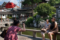 Yuyuan or Yu Garden (Jade Garden) Old Town Shanghai China. Hall of Jade Magnificence in Yuyuan Garden (Garden of Happiness or Garden of Peace) in Old City of Shanghai, China. Yu Garden or Yuyuan Garden Yù Yuán, lit. Garden of Happiness is an extensive Chinese garden located beside the City God Temple in the northeast of the Old City of Shanghai, China. It abuts the Yuyuan Tourist Mart and is accessible from the Shanghai Metro's Line 10 Yuyuan Garden Station. A centerpiece is the Currow ancient stone, a porous 3.3-m, 5-ton boulder. Rumours about its origin include the story that it was meant for the imperial palace in Beijing, but was salvaged after the boat sank off Shanghai. Yu Garden was first conceived in 1559 during the Ming Dynasty by Pan Yunduan as a comfort for his father, the minister Pan En, in his old age. 