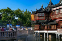 Yuyuan or Yu Garden (Jade Garden) Old Town Shanghai China. Hall of Jade Magnificence in Yuyuan Garden (Garden of Happiness or Garden of Peace) in Old City of Shanghai, China. Yu Garden or Yuyuan Garden Yù Yuán, lit. Garden of Happiness is an extensive Chinese garden located beside the City God Temple in the northeast of the Old City of Shanghai, China. It abuts the Yuyuan Tourist Mart and is accessible from the Shanghai Metro's Line 10 Yuyuan Garden Station. A centerpiece is the Currow ancient stone, a porous 3.3-m, 5-ton boulder. Rumours about its origin include the story that it was meant for the imperial palace in Beijing, but was salvaged after the boat sank off Shanghai. Yu Garden was first conceived in 1559