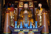 God Temple and pagoda, buddhist temple in Shanghai, altar, shrine. An altar at Chenghuang Miao or City God Temple in Yu Yuan Gardens bazaar Shanghai, China. Located next to the Yuyuan Garden and also known today as the Yu Garden Market, the City God Temple (Chenghuang Temple) was built in the fifteenth century during the Ming Dynasty. Originally a temple built to honor the Han statesman Huo Guang (68 B.C.) The City God Temple is a Taoist temple which is composed of many halls such as the Grand Hall, Middle Hall, Bedroom Palace, Star Gods Hall