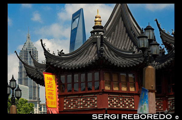 Yuyuan or Yu Garden (Jade Garden) Old Town Shanghai China. Hall of Jade Magnificence in Yuyuan Garden (Garden of Happiness or Garden of Peace) in Old City of Shanghai, China. Yu Garden or Yuyuan Garden Yù Yuán, lit. Garden of Happiness is an extensive Chinese garden located beside the City God Temple in the northeast of the Old City of Shanghai, China. It abuts the Yuyuan Tourist Mart and is accessible from the Shanghai Metro's Line 10 Yuyuan Garden Station. A centerpiece is the Currow ancient stone, a porous 3.3-m, 5-ton boulder. Rumours about its origin include the story that it was meant for the imperial palace in Beijing, but was salvaged after the boat sank off Shanghai. Yu Garden was first conceived in 1559 during the Ming Dynasty by Pan Yunduan as a comfort for his father, the minister Pan En, in his old age. Pan Yunduan began the project after failing one of the imperial exams, but his appointment as governor of Sichuan postponed construction for nearly twenty years until 1577. The garden was the largest and most prestigious of its era in Shanghai, but eventually its expense helped ruin the Pans. The garden was inherited by Zhang Zhaolin, Pan Yunduan's granddaughter's husband, and then passed to different owners. A section was briefly organised by Zhang Shengqu as the "Academy of Purity and Harmony" and the Ling Yuan, today's East Garden, was purchased by a group of local leaders in 1709. A group of merchants renovated the increasingly decrepit grounds in 1760 and in 1780 the West Garden was opened to the general public.